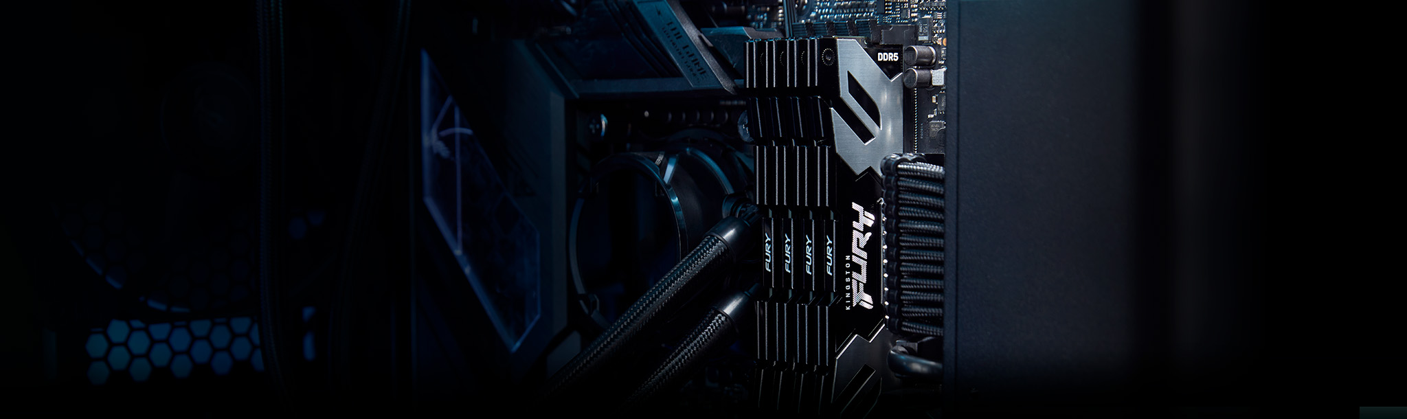 A vertical view of four Kingston FURY Renegade DDR5 memory modules, in black, mounted inside a motherboard